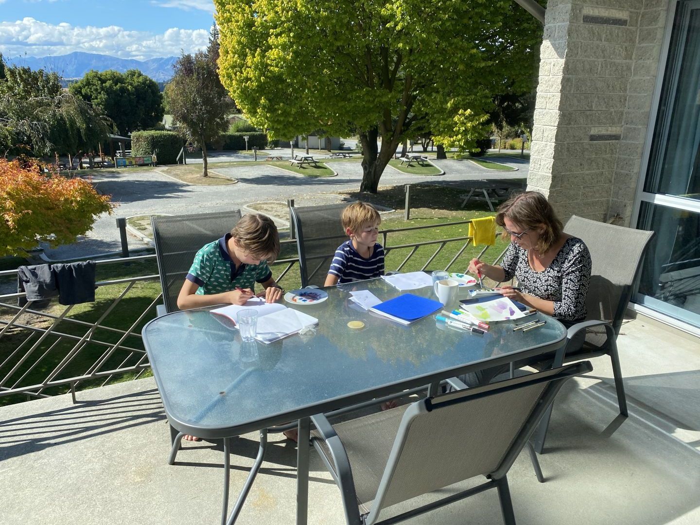 Kids being homeschooled while staying at Wanaka Top 10 Holiday park during COVID-19 lockdown.